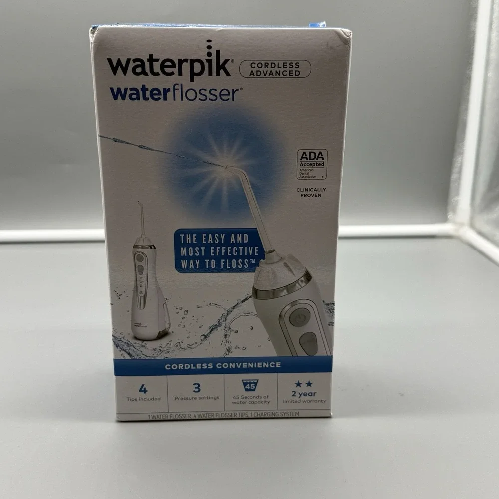 NEW Waterpik Cordless Advanced Water Flosser 3 Pressure Settings White WP-560CD